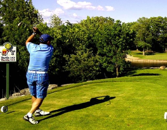 Teeing off at the 12th hole